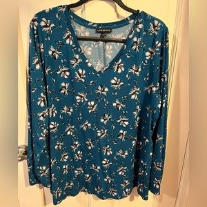 Blue/turquoise long sleeve, v-neck  top with white flowers